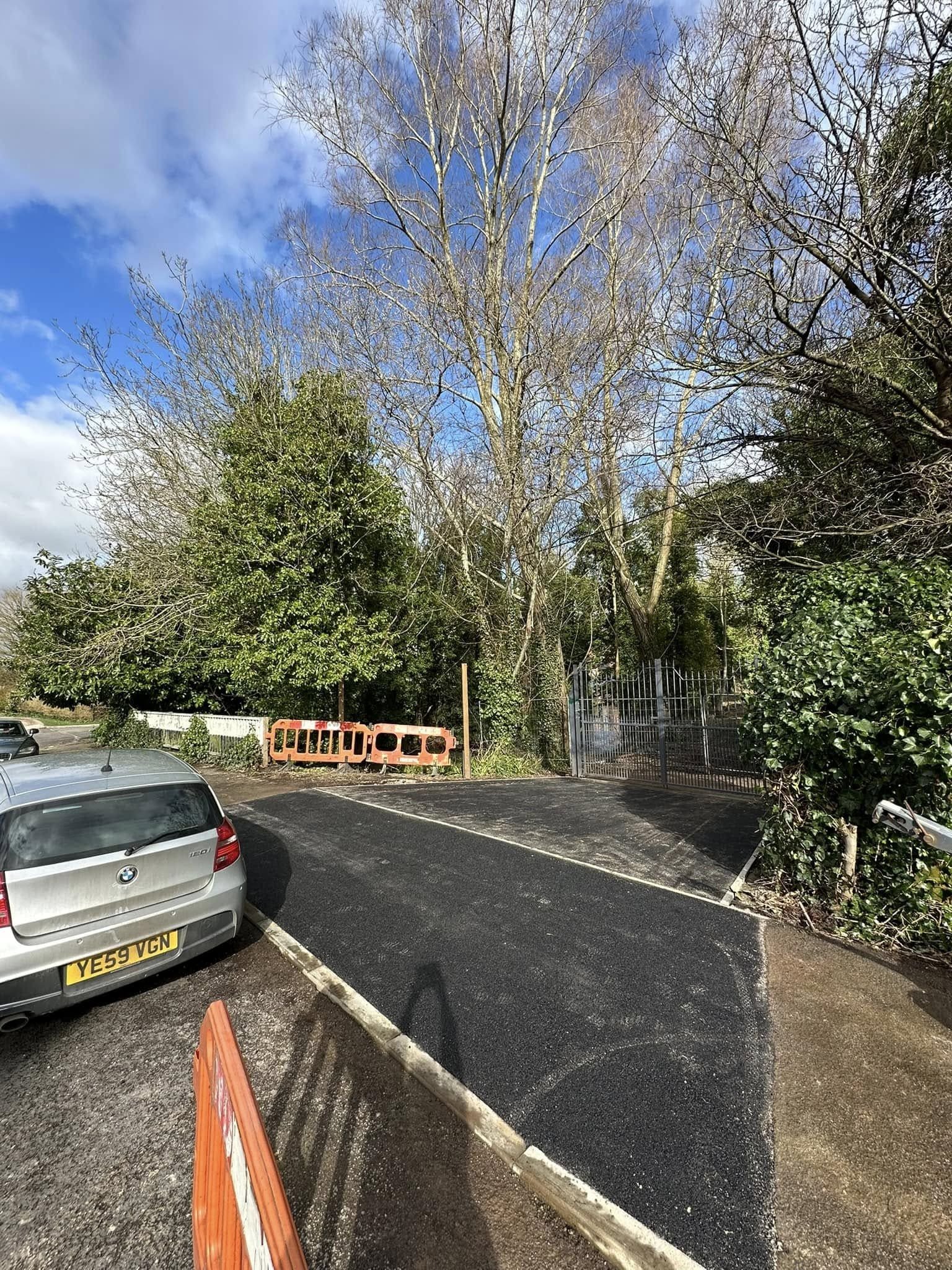 Textured concrete paving with contemporary metal railings for commercial properties in Slough and Berkshire