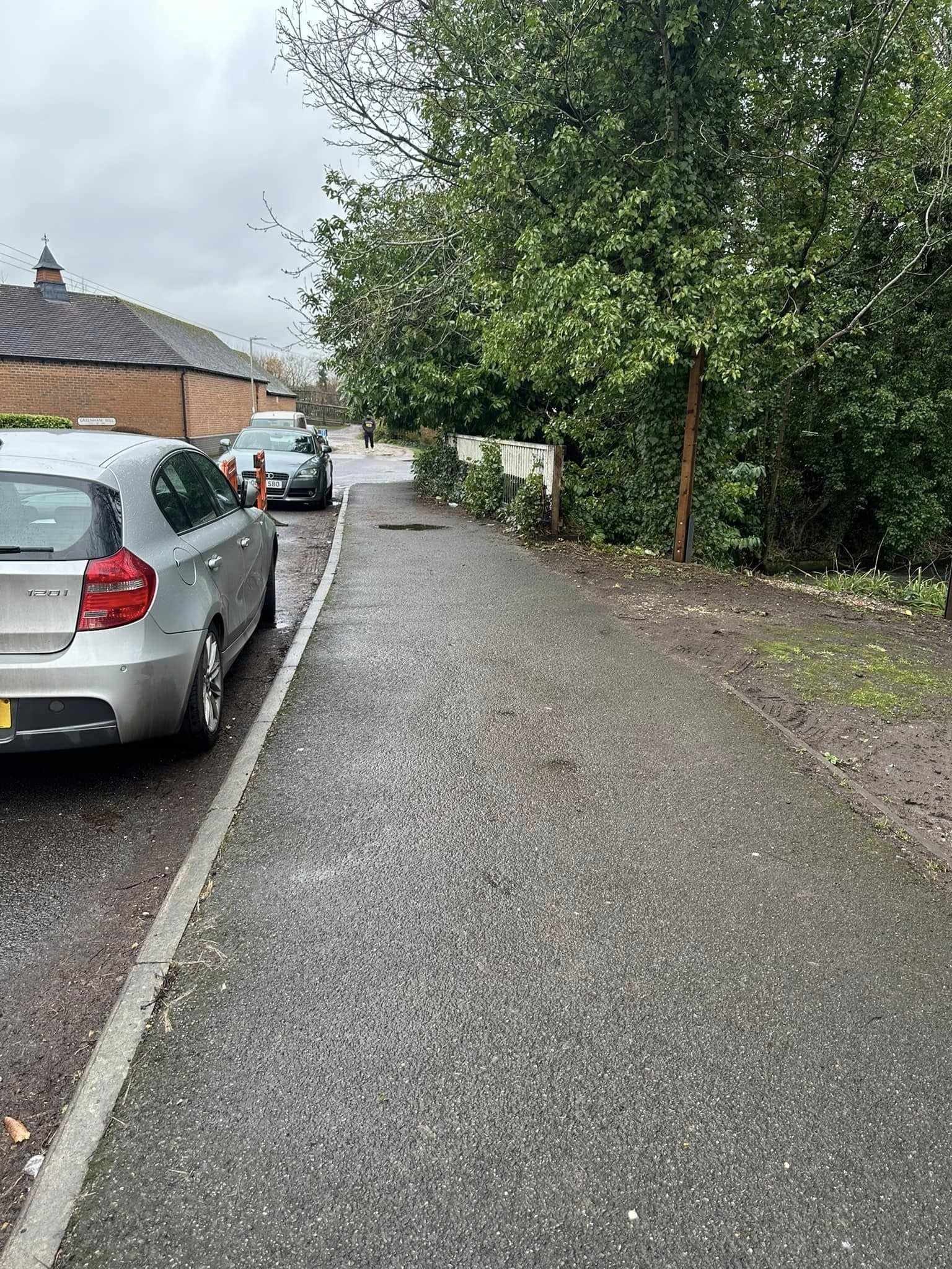 Rustic cobblestone paving with traditional wooden fencing for cottage gardens in Maidenhead and Berkshire