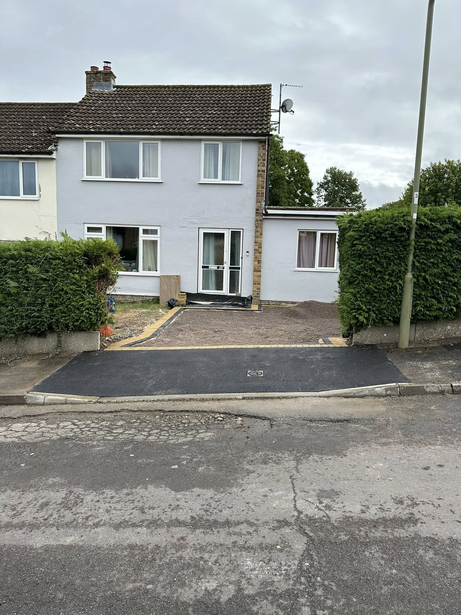 Rustic timber fencing with stone borders for complete Berkshire garden transformation