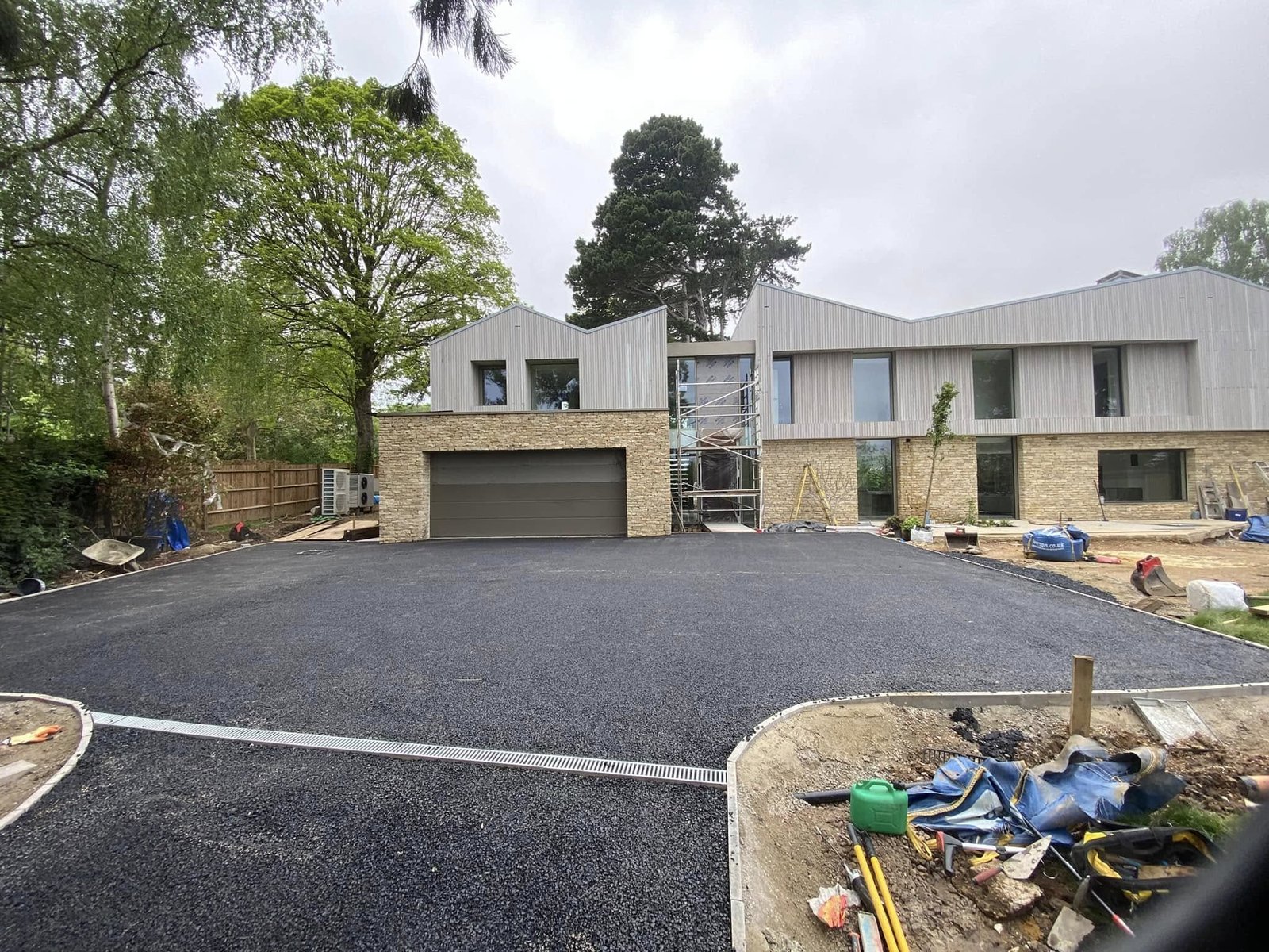 Granite paving with brick edging and picket fencing for period properties in Henley-on-Thames and Berkshire